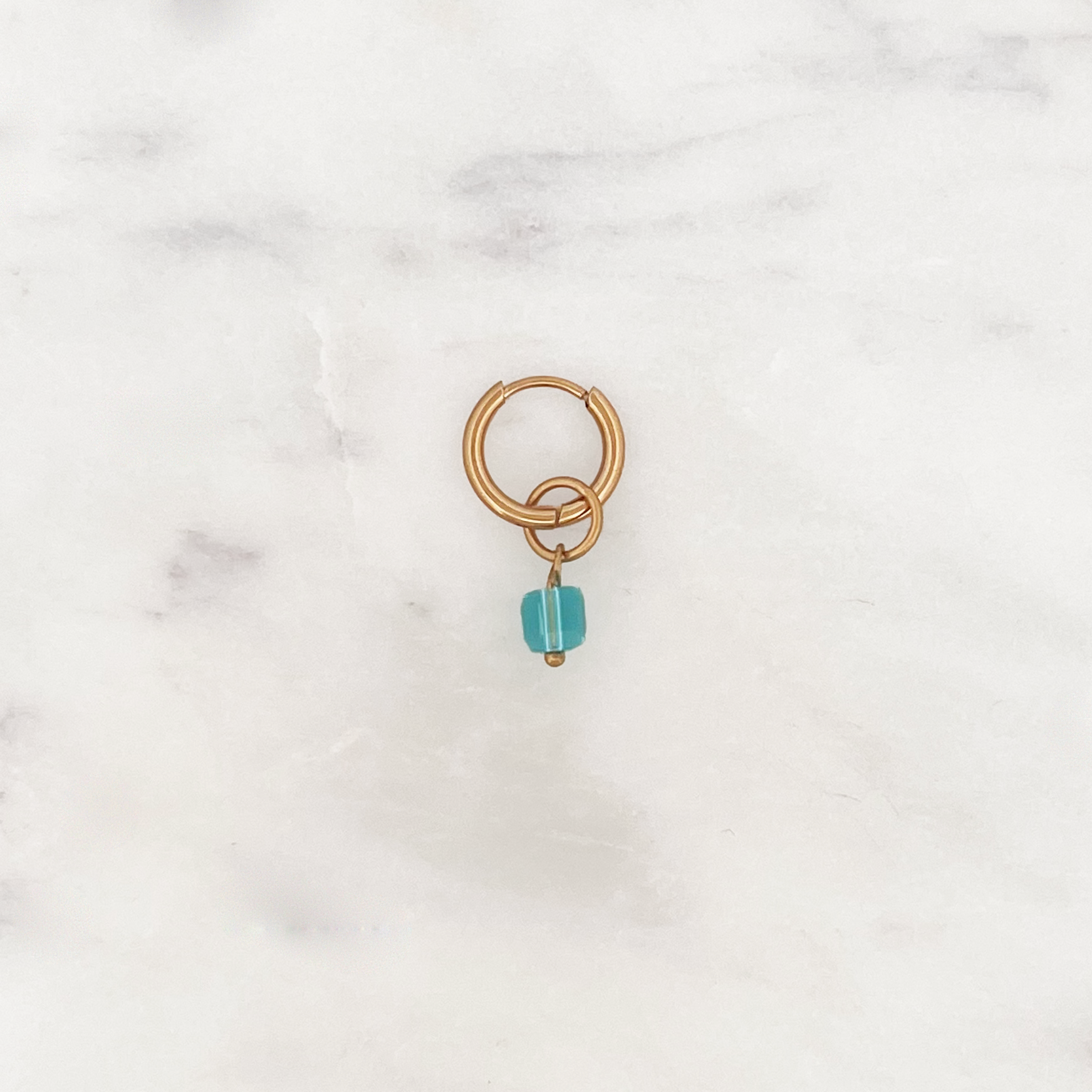 Tiny Huggie Blue Cube